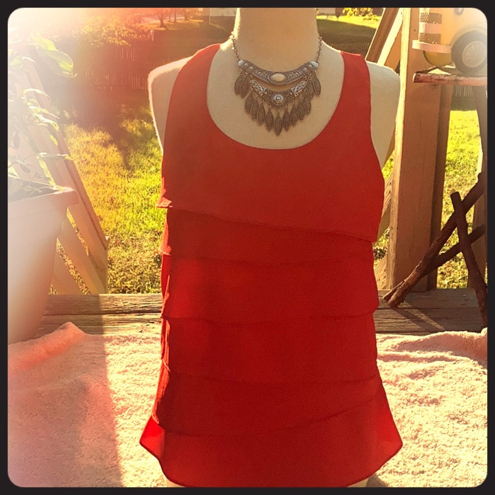 Frilly, fiery red-orange layered top